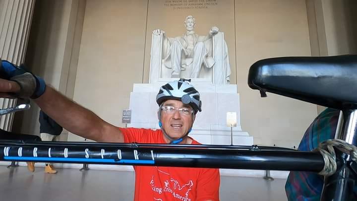 Mike with bike in front of Lincoln memorial